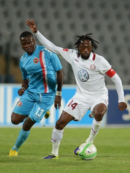 Galabgwe Moyana of Polokwane City and Lerato Chabangu (R) of Moroka Swallows during the Absa Premiership match between Moroka Swallows and Polokwane City at Dobsonville Stadium on December 18, 2013 in Dobsonville, South Africa. (Dec. 17, 2013 - Source: Gallo Images/Getty Images Europe)