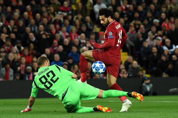Milan Borjan of FK Crvena Zvezda saves a shot from Mohamed Salah of Liverpool during the Group C match of the UEFA Champions League between Liverpool and FK Crvena Zvezda at Anfield on October 24, 2018 in Liverpool, United Kingdom. (Oct. 23, 2018 - Source: Michael Regan/Getty Images Europe)