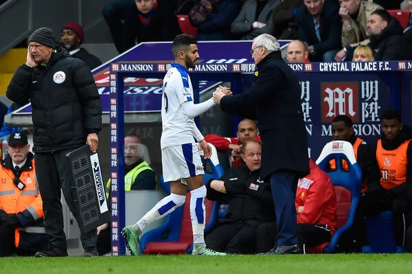 Riyad Mahrez of Leicester City shakes hands with manager Claudio Ranieri as he is replaced during the Barclays Premier League match between Crystal Palace and Leicester City at Selhurst Park on March 19, 2016 in London, United Kingdom. (March 18, 2016 - Source: Mike Hewitt/Getty Images Europe)