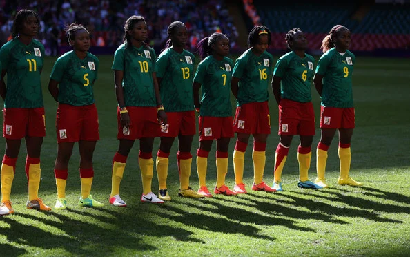 Cameroon line up before the Women's Football first round Group E Match between Great Britain and Cameroon on Day 1 of the London 2012 Olympic Games at Millennium Stadium on July 28, 2012 in Cardiff, Wales. (July 27, 2012 - Source: Julian Finney/Getty Images Europe)