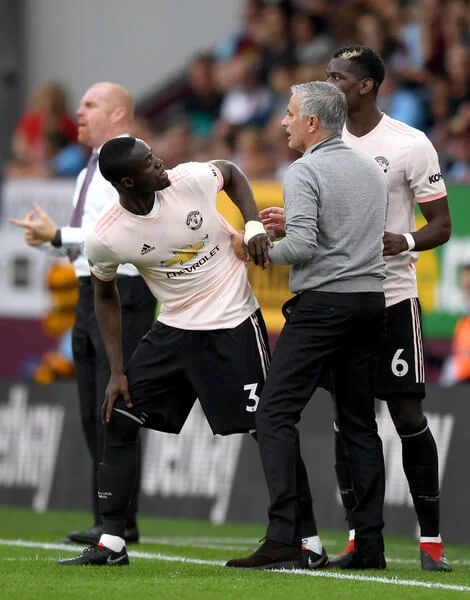 Jose Mourinho, Manager of Manchester United in discussion with Eric Bailly of Manchester United during the Premier League match between Burnley FC and Manchester United at Turf Moor on September 2, 2018 in Burnley, United Kingdom. (Sept. 1, 2018 - Source: Shaun Botterill/Getty Images Europe)