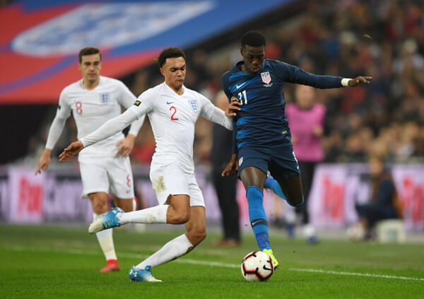 Timothy Weah of the United States is challenged by Trent Alexander-Arnold of England during the International Friendly match between England and United States at Wembley Stadium on November 15, 2018 in London, United Kingdom. (Nov. 14, 2018 - Source: Shaun Botterill/Getty Images Europe)