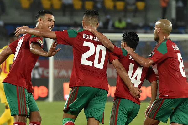 Morocco's forward Aziz Bouhaddouz (2nd-L) celebrates with teammates after scoring a goal during the 2017 Africa Cup of Nations group C football match between Morocco and Togo in Oyem on January 20, 2017. / AFP / ISSOUF SANOGO (Jan. 19, 2017 - Source: AFP)