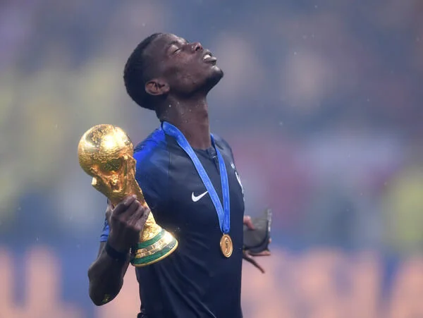 Paul Pogba of France celebrates with the World Cup Trophy following the 2018 FIFA World Cup Russia Final between France and Croatia at Luzhniki Stadium on July 15, 2018 in Moscow, Russia. (July 14, 2018 - Source: Laurence Griffiths/Getty Images Europe)