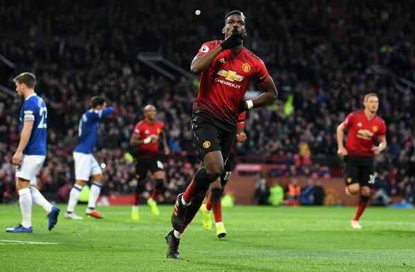 Paul Pogba of Manchester United celebrates after scoring his team's first goal during the Premier League match between Manchester United and Everton FC at Old Trafford on October 28, 2018 in Manchester, United Kingdom. (Oct. 27, 2018 - Source: Michael Regan/Getty Images Europe)