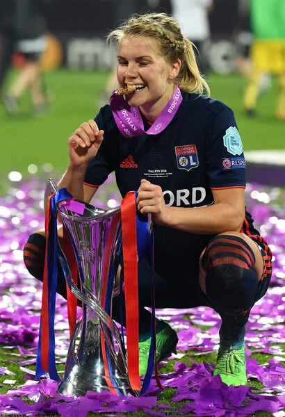 Ada Hegerberg of Lyon celebrates with the trophy during the UEFA Womens Champions League Final between VfL Wolfsburg and Olympique Lyonnais on May 24, 2018 in Kiev, Ukraine. (May 23, 2018 - Source: David Ramos/Getty Images Europe)