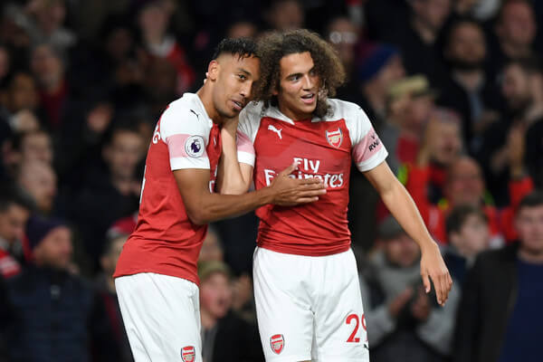 Pierre-Emerick Aubameyang of Arsenal celbrates with Matteo Guendouzi of Arsenal after he scores his sides third goal during the Premier League match between Arsenal FC and Leicester City at Emirates Stadium on October 22, 2018 in London, United Kingdom. (Oct. 21, 2018 - Source: Shaun Botterill/Getty Images Europe)