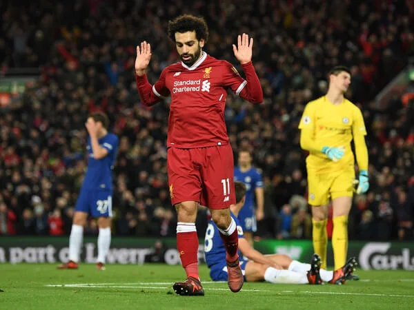 Mohamed Salah of Liverpool celebrates scoring his sides first goal during the Premier League match between Liverpool and Chelsea at Anfield on November 25, 2017 in Liverpool, England. (Nov. 24, 2017 - Source: Shaun Botterill/Getty Images Europe)