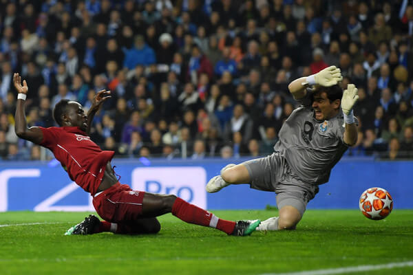 Sadio Mane of Liverpool scores his team's first goal under pressure from Iker Casillas of FC Porto during the UEFA Champions League Quarter Final second leg match between Porto and Liverpool at Estadio do Dragao on April 17, 2019 in Porto, Portugal. (April 16, 2019 - Source: Getty Images Europe)