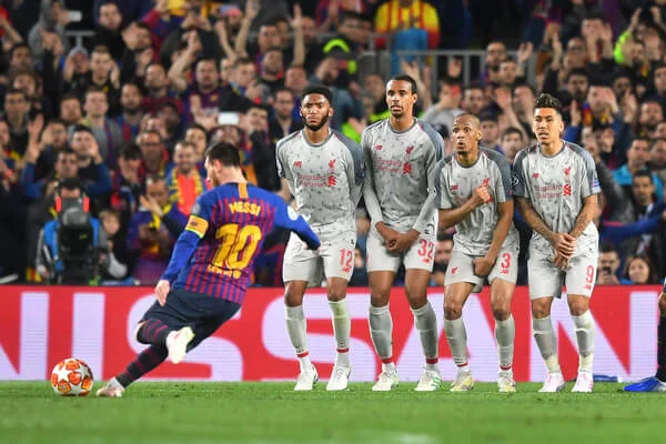 Lionel Messi of Barcelona scores his sides third goal from a free kick during the UEFA Champions League Semi Final first leg match between Barcelona and Liverpool at the Nou Camp on May 01, 2019 in Barcelona, Spain. (April 30, 2019 - Source: Michael Regan/Getty Images Europe)
