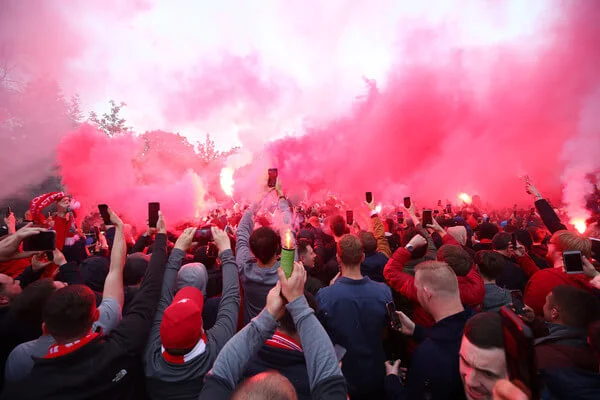 Fans of Liverpool enjoy the pre match atmosphere with flares prior to the UEFA Champions League Semi Final second leg match between Liverpool and Barcelona at Anfield on May 07, 2019 in Liverpool, England. (May 6, 2019 - Source: Getty Images Europe)