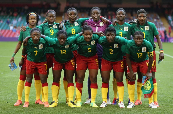 Cameroon line up during the Women's Football first round Group E Match of the London 2012 Olympic Games between Cameroon and Brazil at Millennium Stadium on July 25, 2012 in Cardiff, Wales. (July 24, 2012 - Source: Julian Finney/Getty Images Europe)