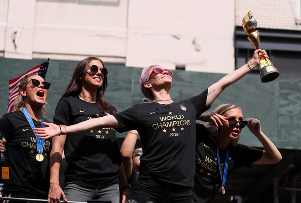 Alex Morgan, Megan Rapinoe, and Allie Long celebrate during the U.S. Women's National Soccer Team Victory Parade and City Hall Ceremony on July 10, 2019 in New York City. (July 9, 2019 - Source: Getty Images North America)