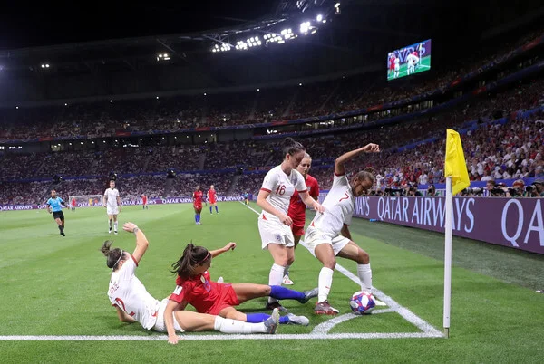 Alex Morgan of the USA is challenged by Lucy Bronze, Jade Moore and Nikita Parris of England during the 2019 FIFA Women's World Cup France Semi Final match between England and USA at Stade de Lyon on July 02, 2019 in Lyon, France. (July 1, 2019 - Source: Getty Images Europe