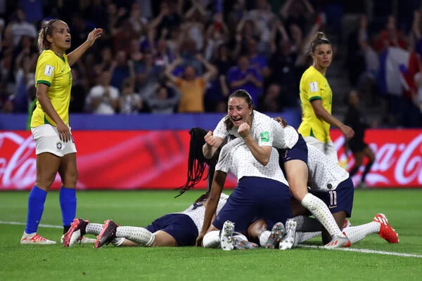 Amandine Henry of France celebrates her team's second goal with team mates during the 2019 FIFA Women's World Cup France Round Of 16 match between France and Brazil at Stade Oceane on June 23, 2019 in Le Havre, France. (June 22, 2019 - Source: Getty Images Europe)