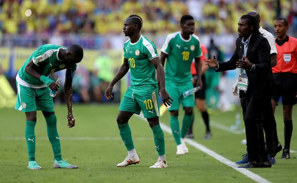 Aliou Cisse, Head coach of Senegal gives instructions to Cheikhou Kouyate and Sadio Mane of Senegal during the 2018 FIFA World Cup Russia group H match between Senegal and Colombia at Samara Arena on June 28, 2018 in Samara, Russia. (June 27, 2018 - Source: Michael Steele/Getty Images Europe)