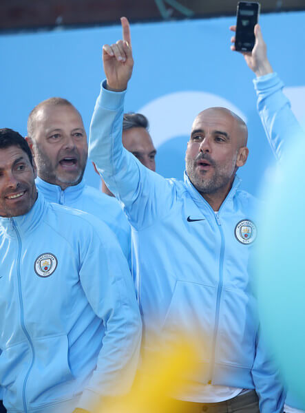 Manchester City Manager Josep Guardiola on stage during the Manchester City Trophy Parade in Manchester city centre on May 14, 2018 in Manchester, England. (May 13, 2018 - Source: Lynne Cameron/Getty Images Europe)