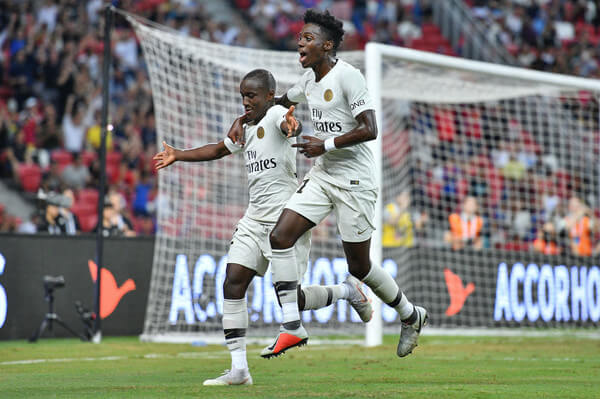 Moussa Diaby and team mate Timothy Weah of Paris Saint Germain celebrates his goal during the International Champions Cup match between Paris Saint Germain and Clu b de Atletico Madrid at the National Stadium on July 30, 2018 in Singapore. (July 29, 2018 - Source: Thananuwat Srirasant/Getty Images AsiaPac)