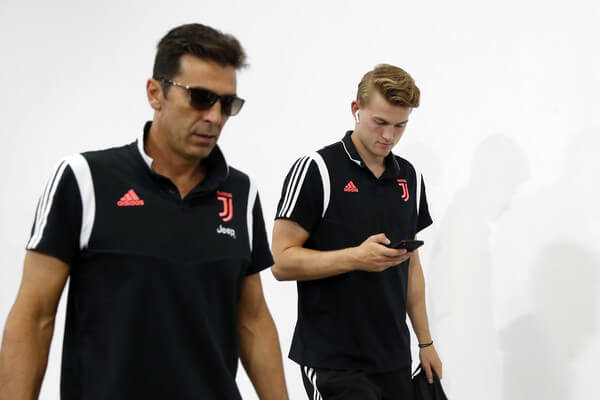Gianluigi Buffon (L) and Matthijs de Ligt (R) of Juventus are seen on arrival at the stadium prior to the International Champions Cup match between Juventus and FC Internazionale at the Nanjing Olympic Center Stadium on July 24, 2019 in Nanjing, China. (July 23, 2019 - Source: Getty Images AsiaPac)