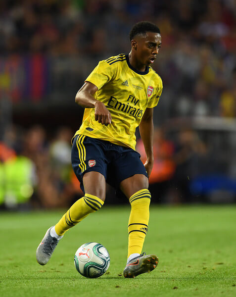 Joe Willock of Arsenal runs with the ball during the Joan Gamper trophy friendly match between FC Barcelona and Arsenal at Nou Camp on August 04, 2019 in Barcelona, Spain. (Aug. 3, 2019 - Source: Getty Images Europe)