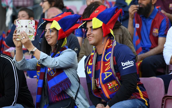 Two Barcelona fans enjoy the pre match atmosphere prior to the La Liga match between Barcelona and Real Madrid at Camp Nou on May 6, 2018 in Barcelona, . (May 5, 2018 - Source: David Ramos/Getty Images Europe)
