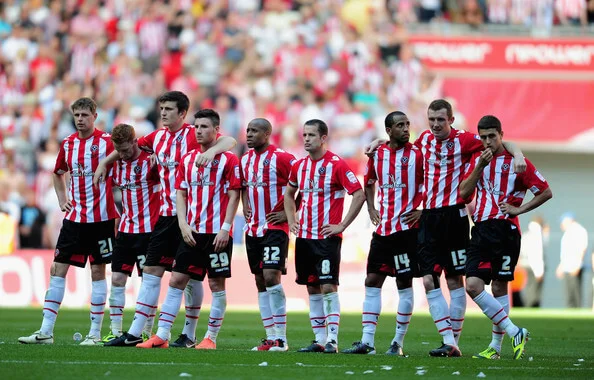 Dejection for players of Sheffield United during the npower League One, playoff final between Huddersfield Town and Sheffield United at Wembley Stadium on May 26, 2012 in London, England. (May 25, 2012 - Source: Jamie McDonald/Getty Images Europe)
