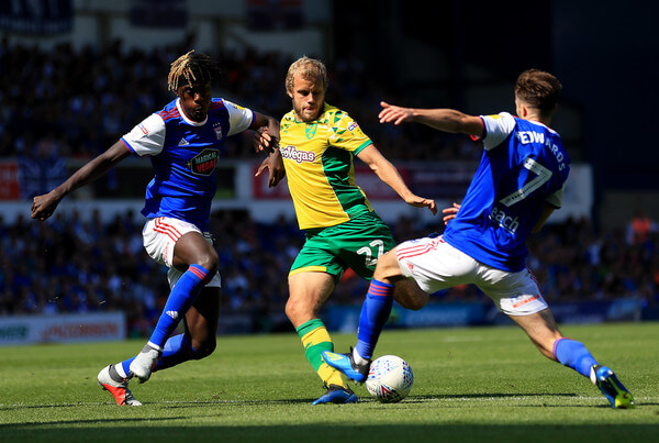 Teemu Pukki of Norwich City is blocked by Trevoh Chalobah and Gwion Edwards of Ipswich Town during the Sky Bet Championship match between Ipswich Town and Norwich City at Portman Road on September 2, 2018 in Ipswich, England. (Sept. 1, 2018 - Source: Stephen Pond/Getty Images Europe)