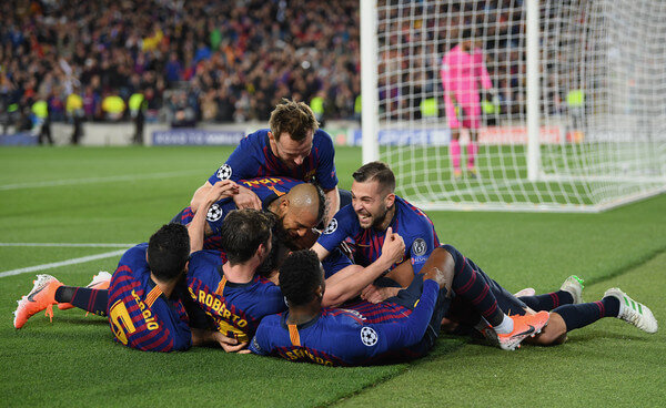 Lionel Messi of Barcelona celebrates with teammates after scoring his team's third goal during the UEFA Champions League Semi Final first leg match between Barcelona and Liverpool at the Nou Camp on May 01, 2019 in Barcelona, Spain. (April 30, 2019 - Source: Getty Images Europe)