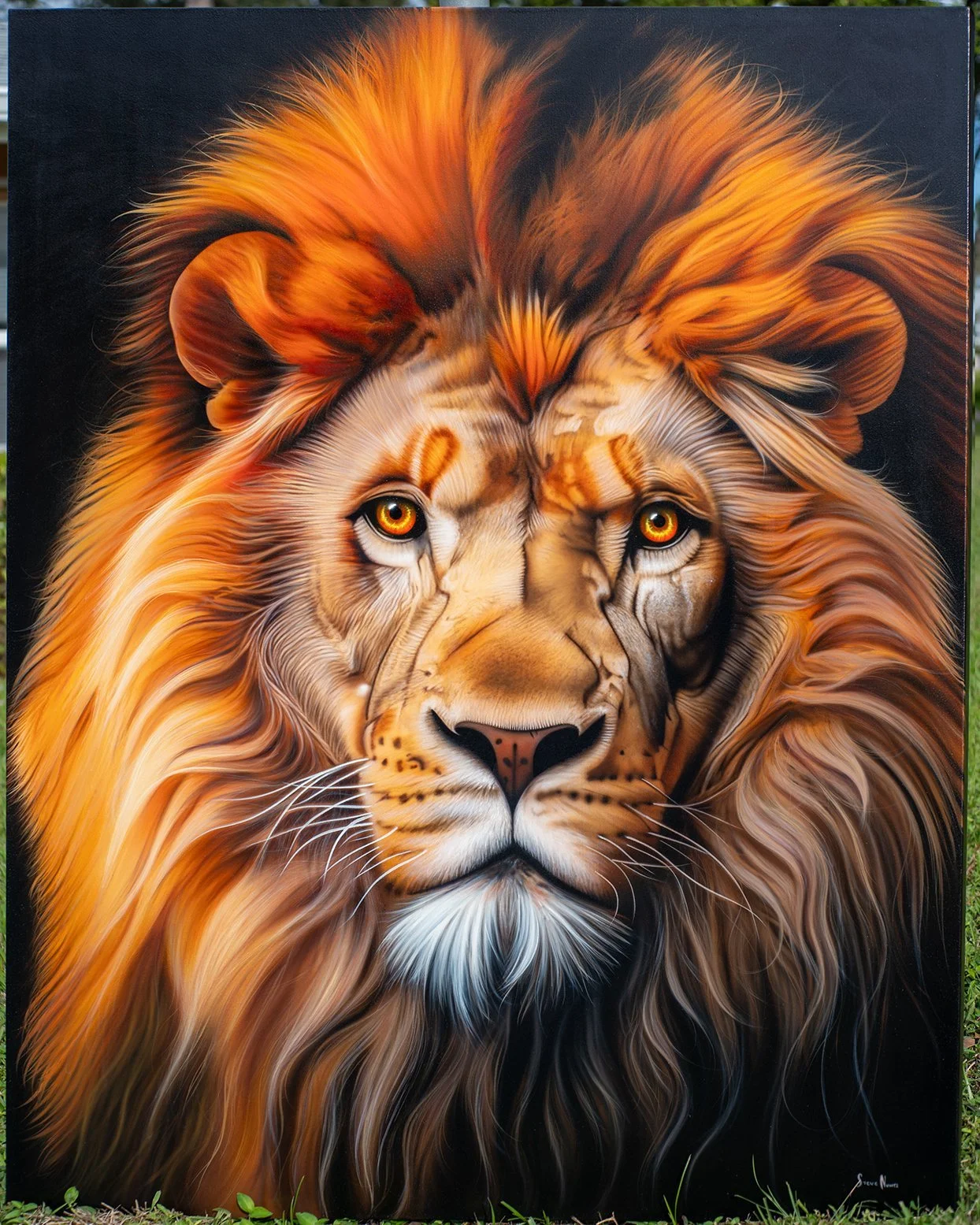 A detailed, realistic painting of a lion's face with a golden mane and piercing amber eyes.