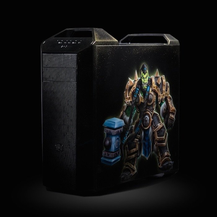 A black computer tower with a Warcraft character graphic on the side, depicting an orc warrior in armor holding a hammer.