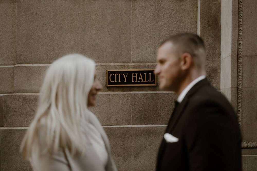couple looking at each other after chicago city hall wedding. photo by chicago wedding photographers The Gernands Photography
