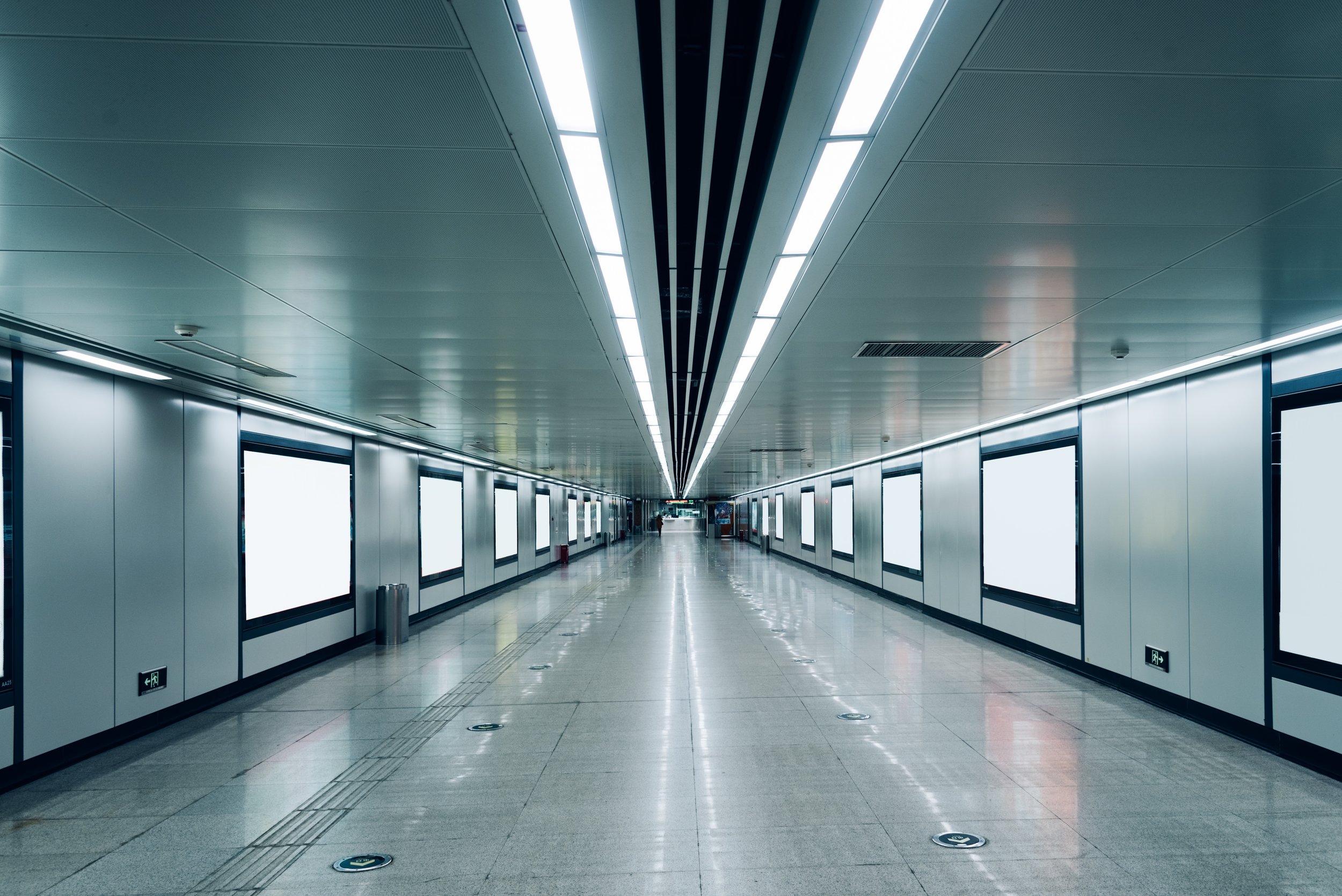 modern-hallway-of-airport-or-subway-station-with-blank-billboards-636850828_8654x5777-squashed.jpeg