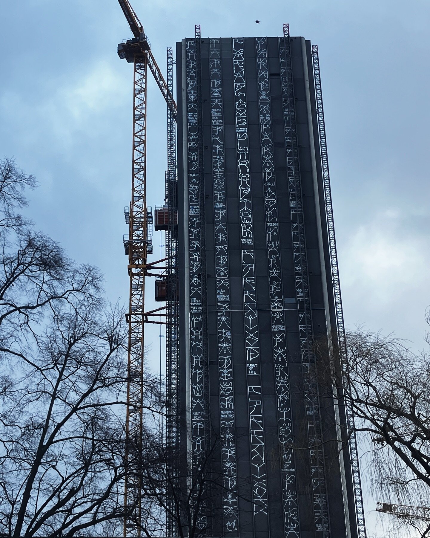 A deeply impressive bit of graffiti from Kreuzberg. It looks like they climbed the lift support structure and did this all by hand.
