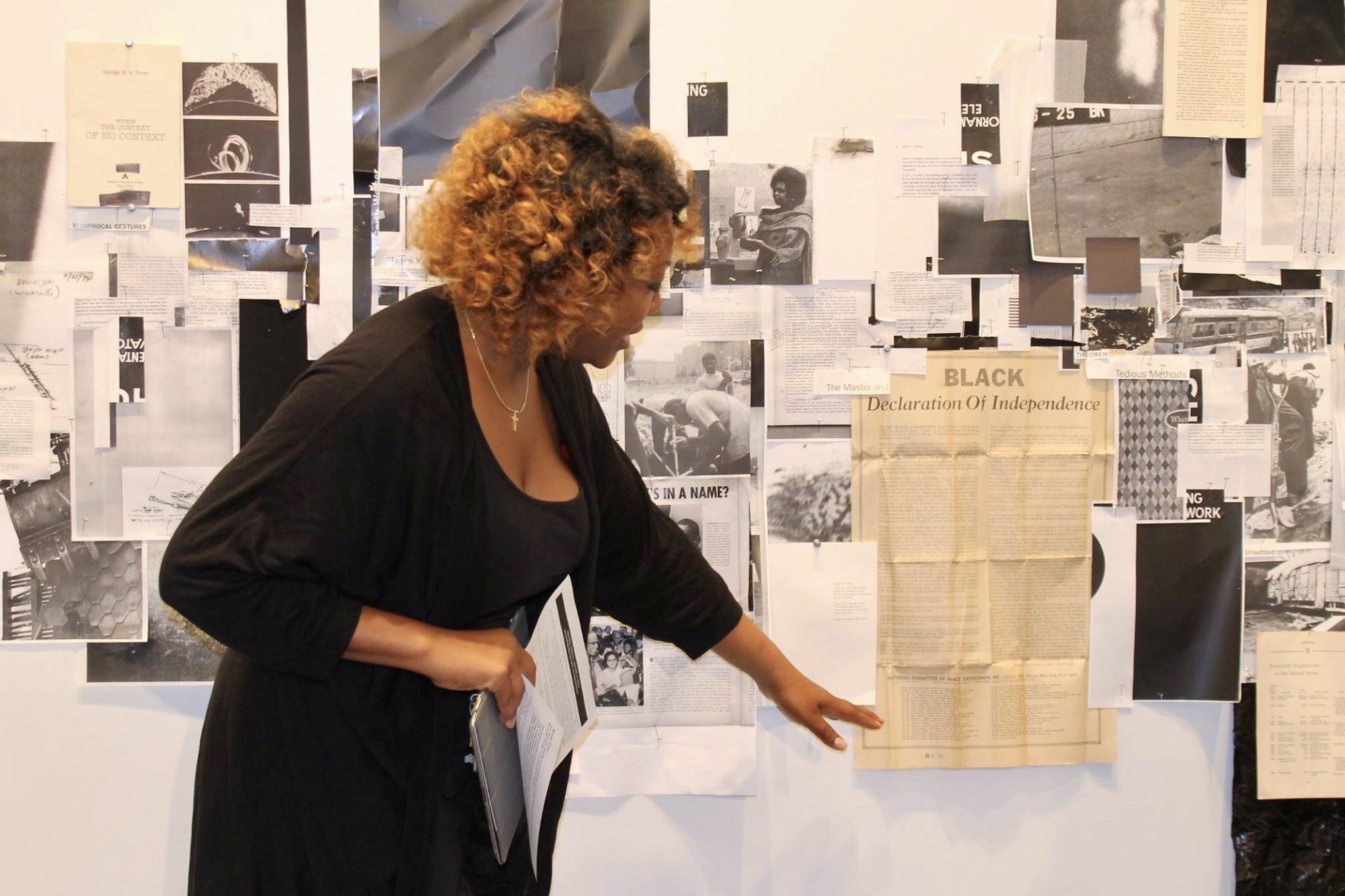 Noel Corbin, leading a guided tour of Kameelah Rasheed’s 2015 Future Perfect exhibition at Weeksville Heritage Center in Brooklyn, New York.
