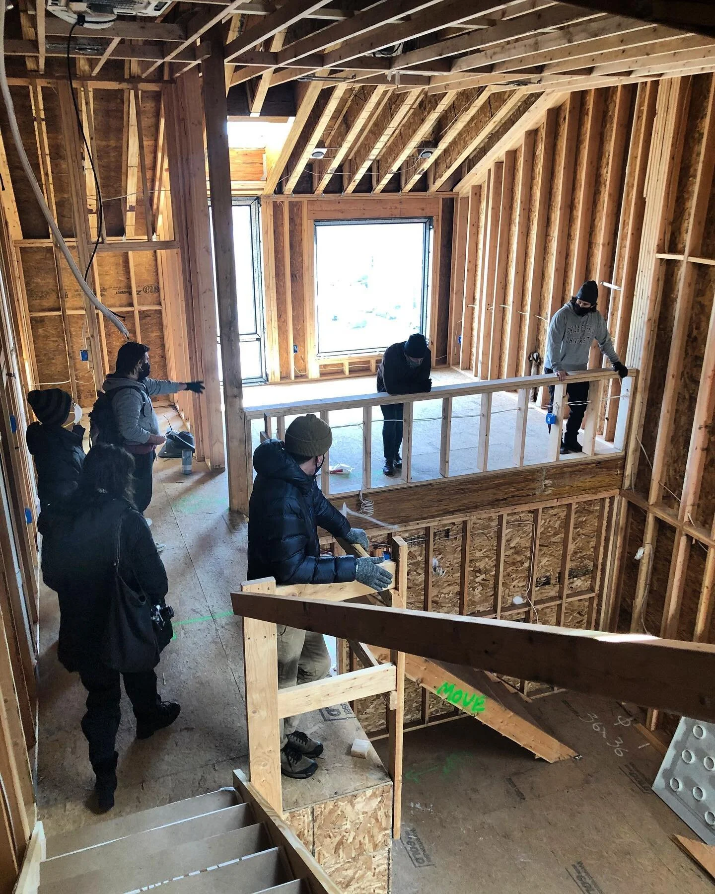 Architects architecting on the mezzanine.  #philly #philadelphia #fishtown #frontst #5storiesup #abovetheel #framing #construction #skylights #rooflines #penthouse #mixeduse #hopest #kjoarchitecture 📷 by @realyunghummus