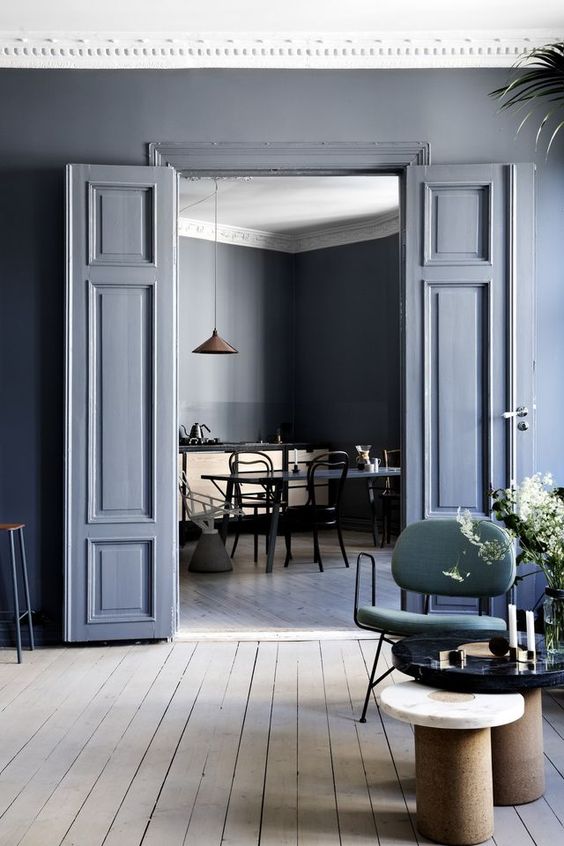 Via Line Klein Because the carrying the blue-grey on the walls onto the trim and doors gives an understated look that makes you look twice and puts attention on the architectural details in a casual-cool kinda way. The tone pairs beautifully with the light, worn wood in the floor and echoed with the side table and buffet ☝🏼
