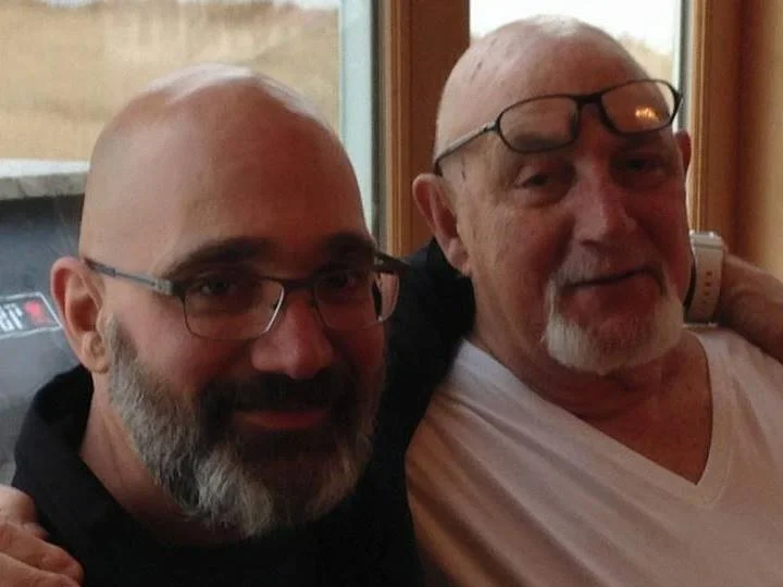 My father, David A. Sloane, and me celebrating his 77th birthday, in March 2015. He passed away three months later.