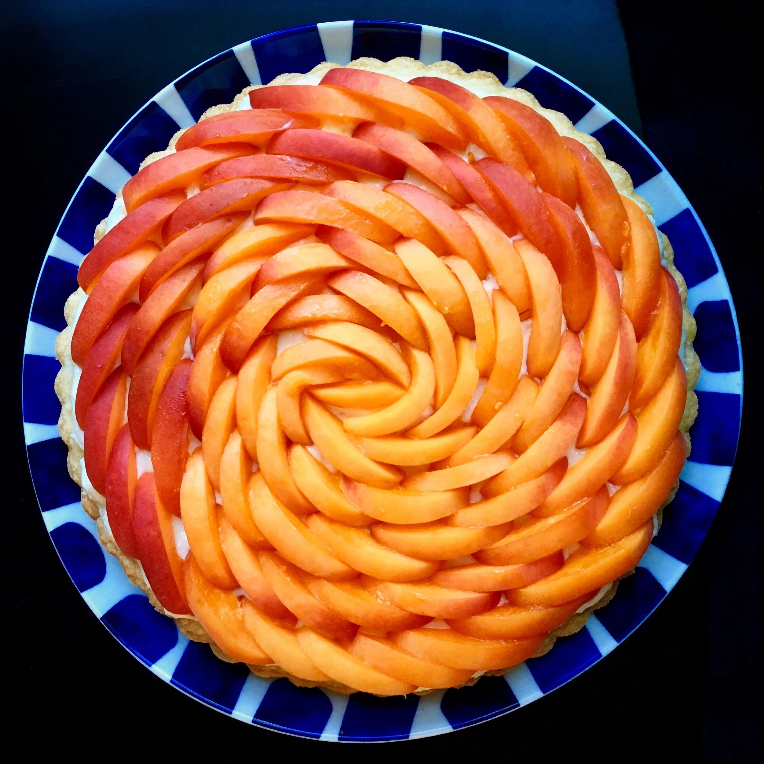  Date: September 7th, 2017   Love makes the swirled go 'round. 💛🌎| Apricot Cream Tart  