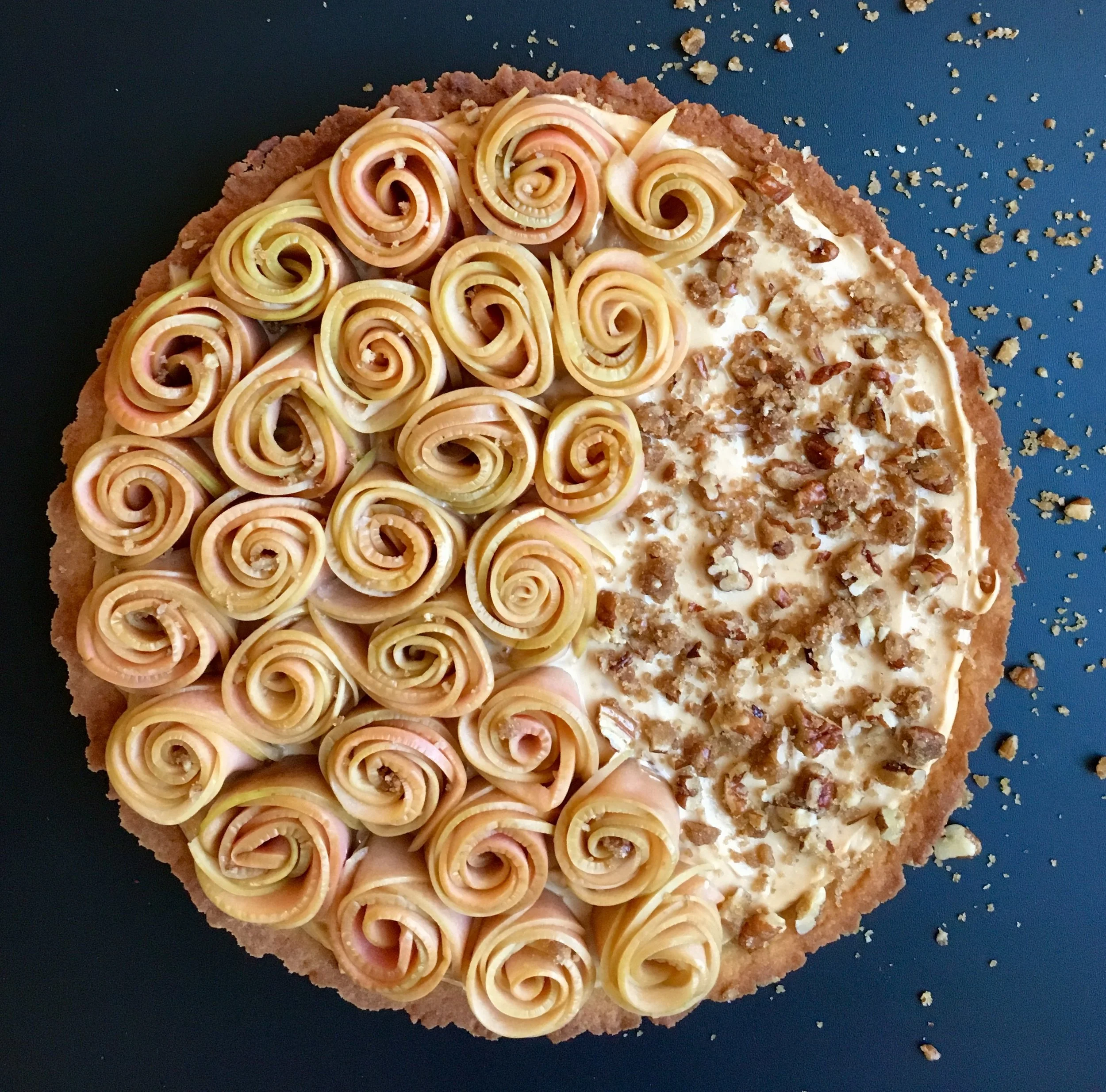  Date: November 2nd, 2017   Puns N’ Roses. 🌹| I know, snore, everybody’s doing the rose apple thing and no one can touch Queen @julie_jonesuk’s technique, but I had to try it (verdict: v slippery). Pink apple rose tart with dulce de leche crème and 