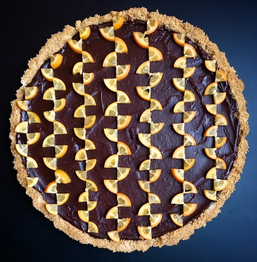  Date: February 2, 2018   What’s love quat to do with it? 🍊| Chocolate tart with chocolate glaze from  @epicurious &nbsp;tiled with tangy kumquats. With Valentine’s approaching, consider this one luxuriant way to help you say “Kumquat may, I’ll love