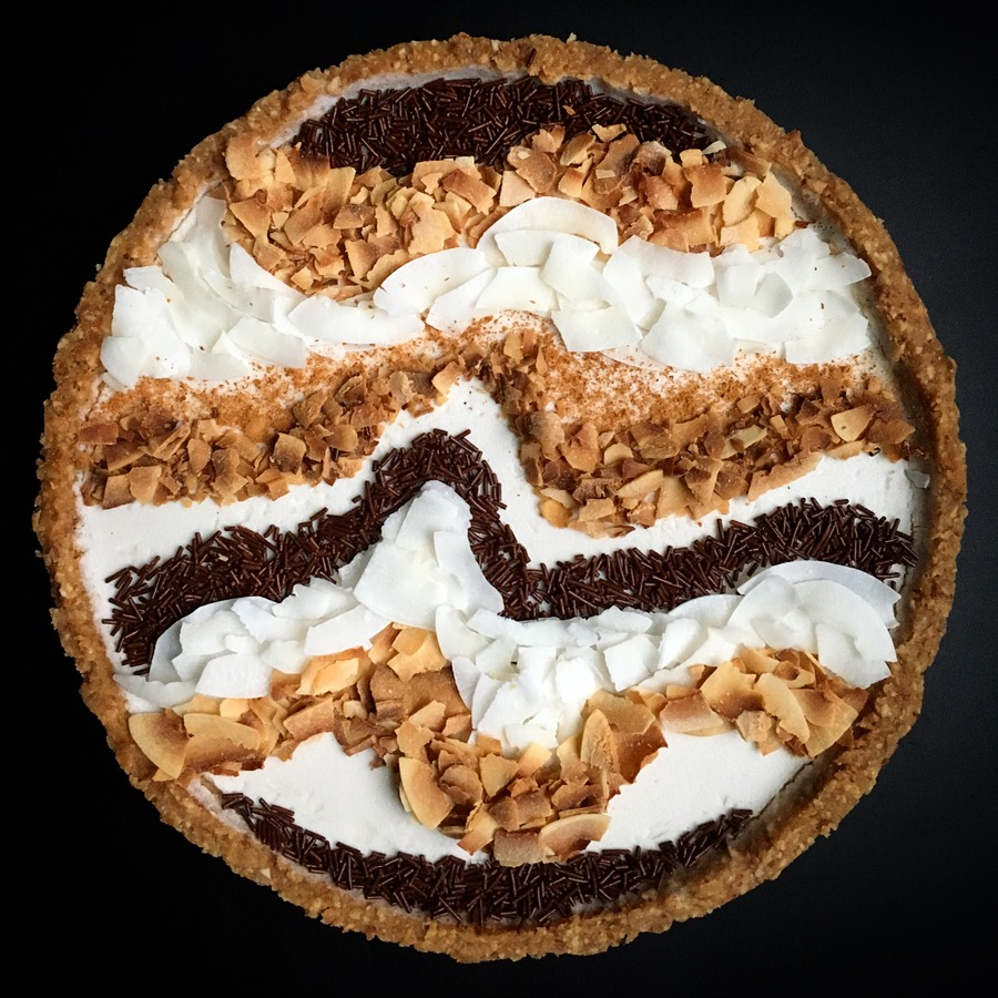  Date: March 23, 2018   Ebb and dough. 🌊|&nbsp;   @unconventionalbaker   ’s Coconut Cream Pie floating underneath ripples of lokonut crunchies. It’s an explocean of flavor in a wave new world, sand I’m tidally here for it. Rip on, brahs, beach and e