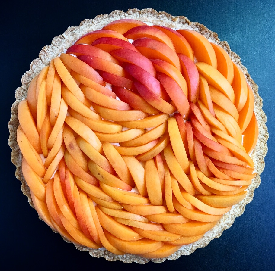   Pits and pieces. 🍑| An apricot cream tart variation of one I made last summer. It’s the best of both swirleds. 🌎🌀     Date: July 16, 2018 