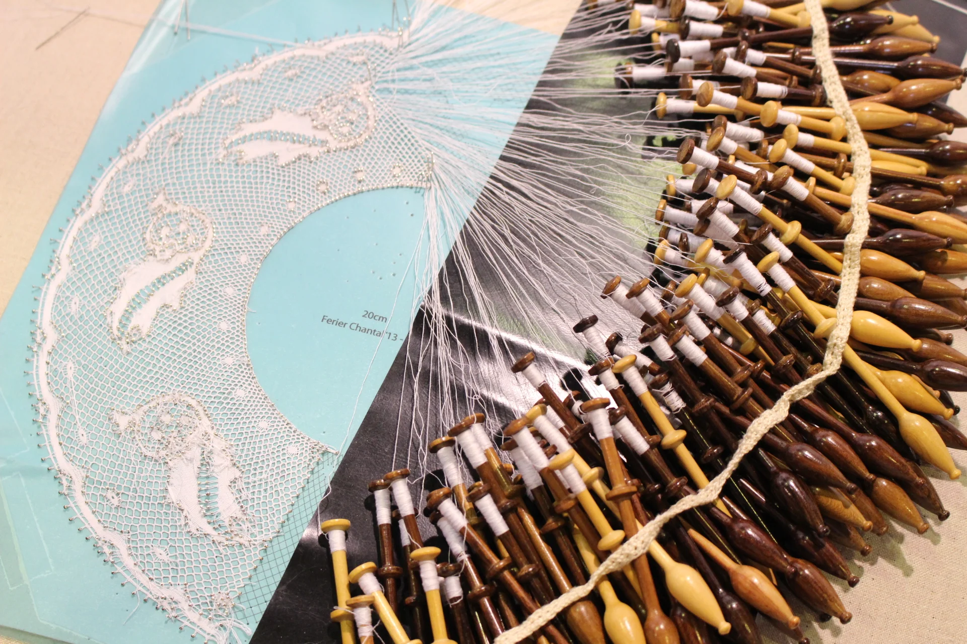  Valenciennes bobbin lace in progress by Chantal Ferrier at the World Lace Congress Brugge, 2018 