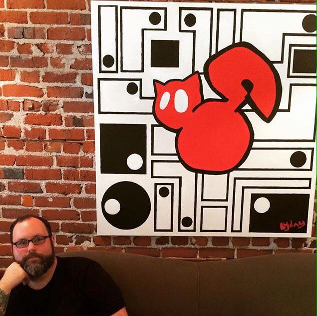William Lyday in front of one of his originals titled Big Red