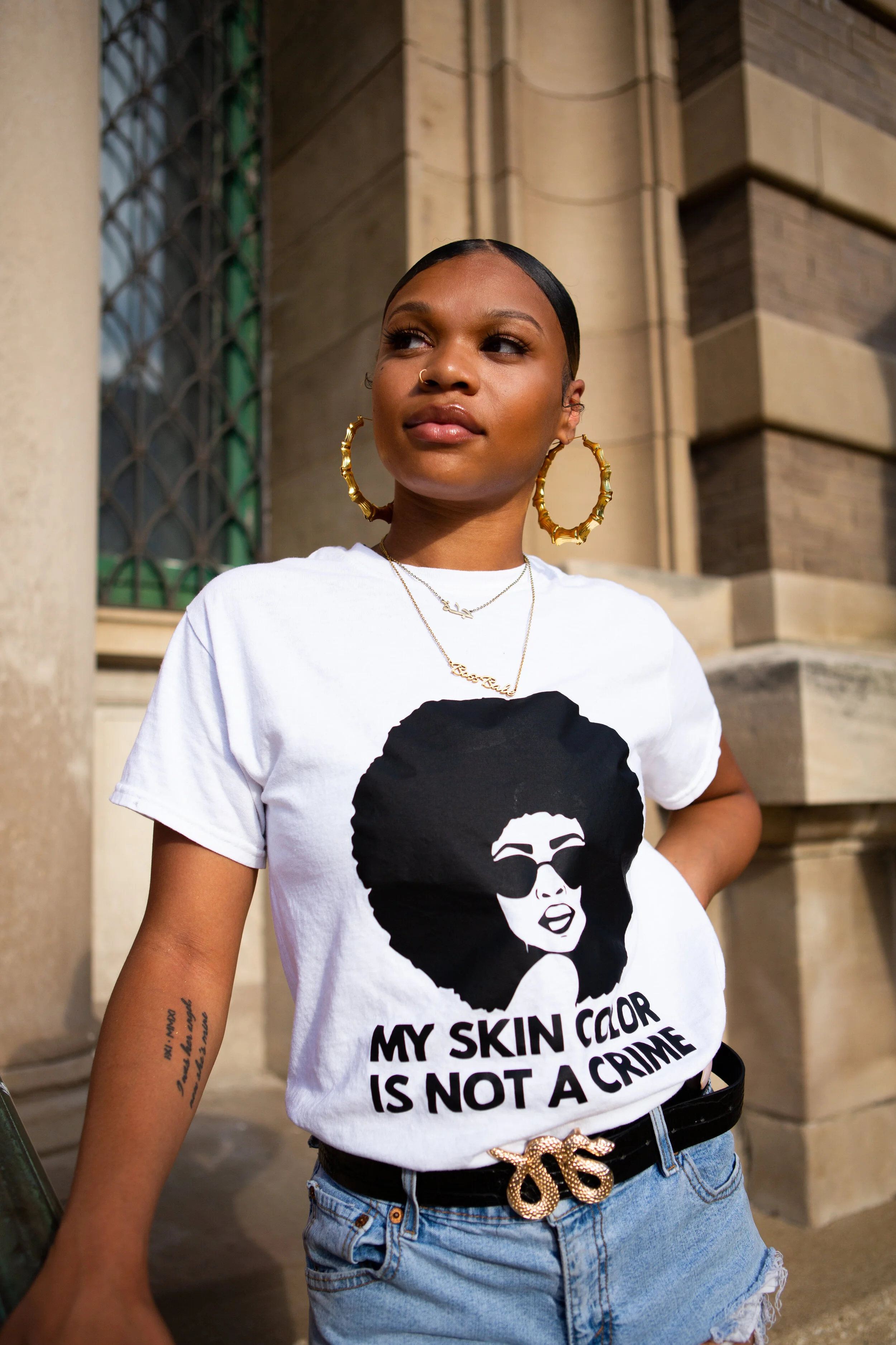 Nalah McWhorter, president of the University of Wisconsin-Madison’s Black Student Union, stands in front of the Historical Society in her hometown of Racine, Wisconsin.
