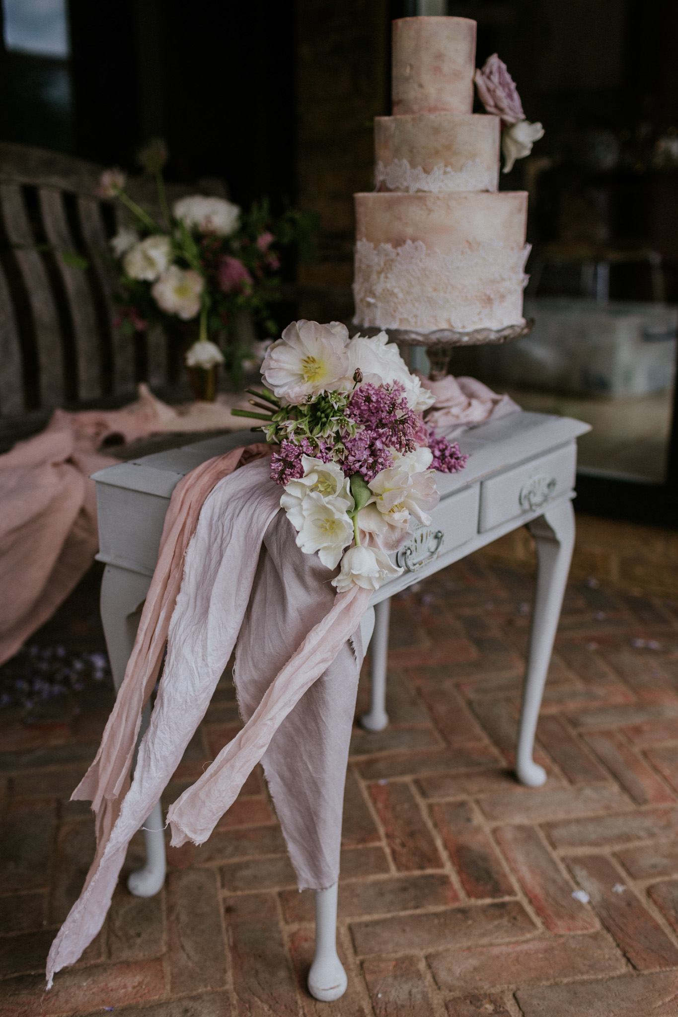 Gorgeous florals and the second beautifully artistic wedding cake design.