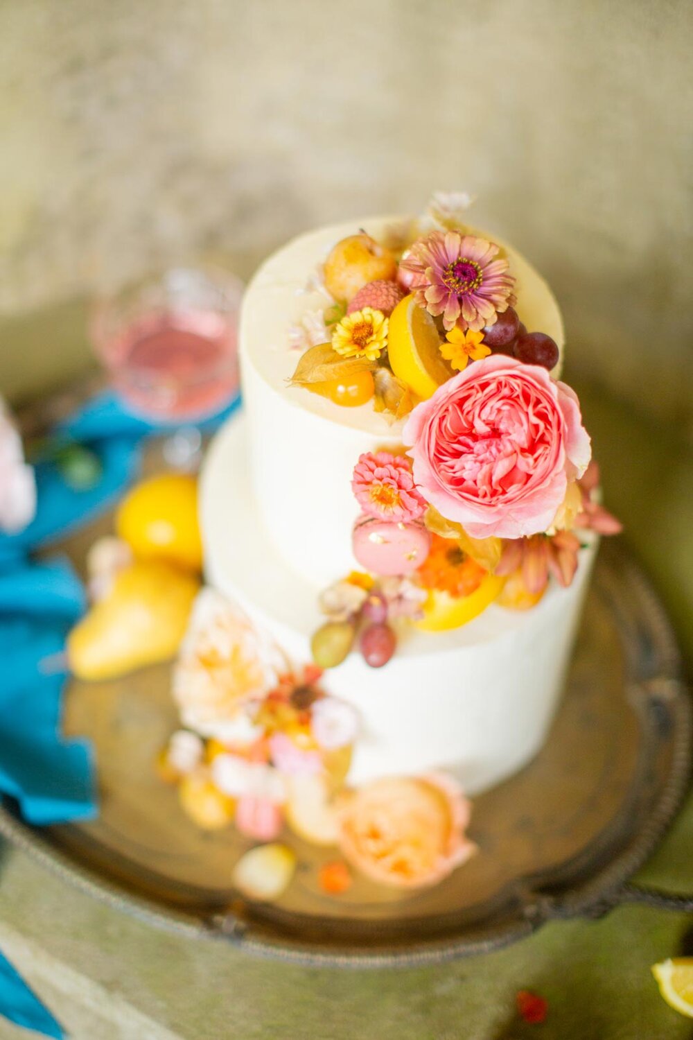 romantic-buttercream-cake-with-cascading-floral-decorations.jpg