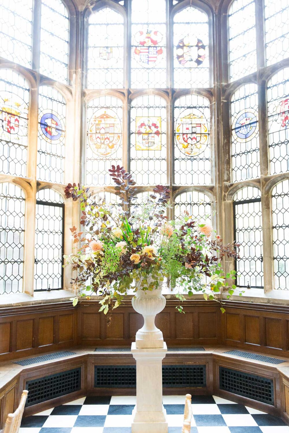 elegant-autumn-moss-stone-floral-design-urn-hengrave-hall-suffolk.jpg