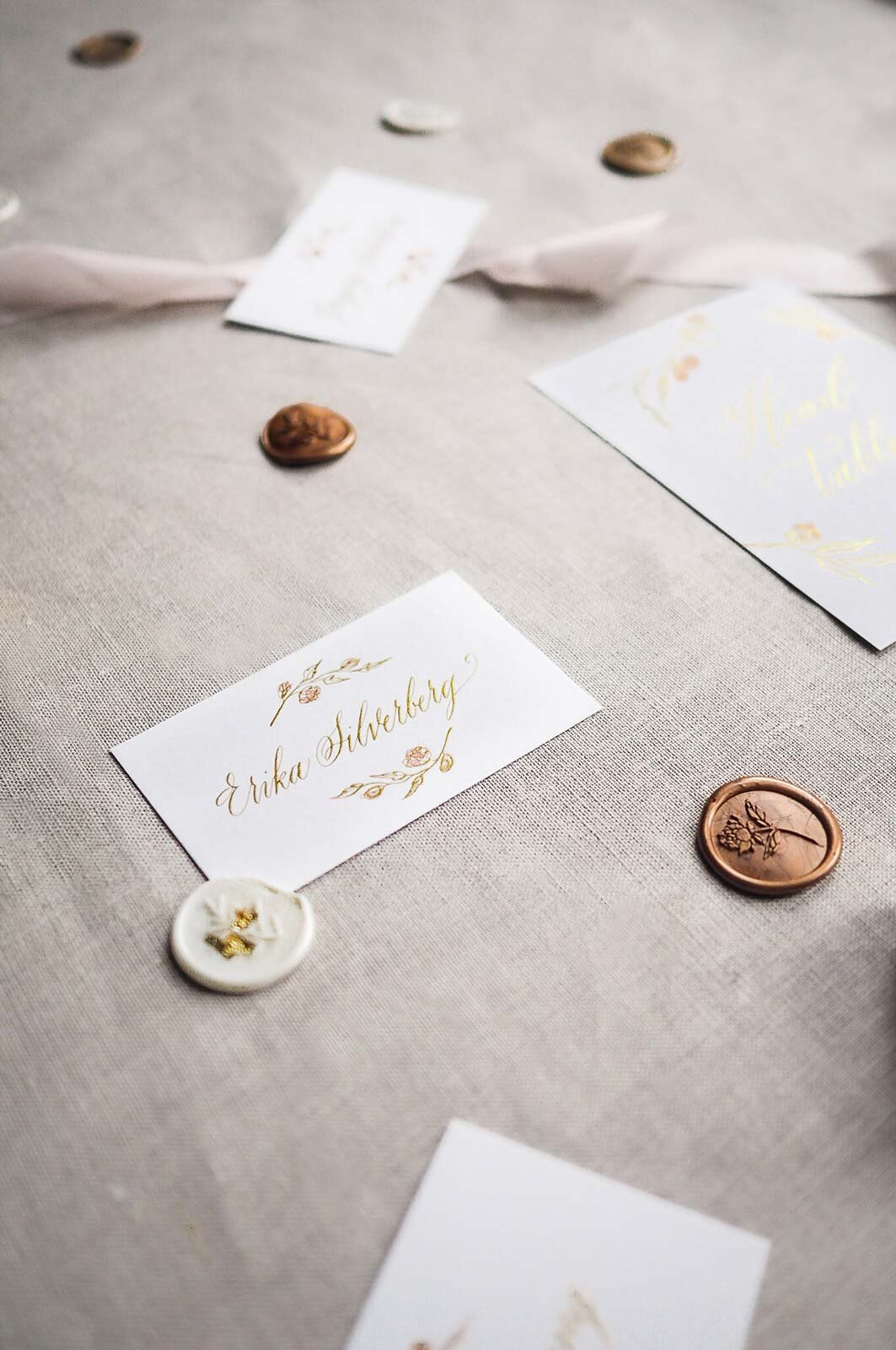 luxury-wedding-calligraphy-place-cards-gold.jpg