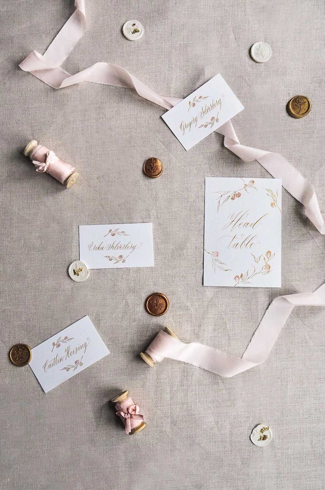 luxury-wedding-calligraphy-table-cards-gold.jpg